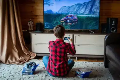 Manette de console de jeu et écran affichant un message d'erreur lors d'une panne réseau