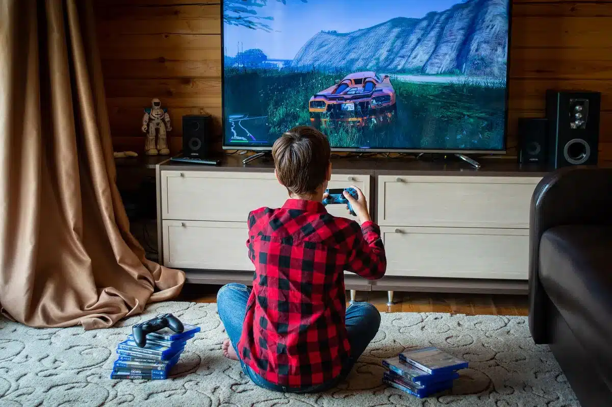 Manette de console de jeu et écran affichant un message d'erreur lors d'une panne réseau